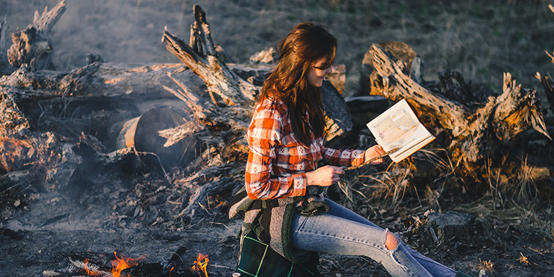 girl sitting in the woods