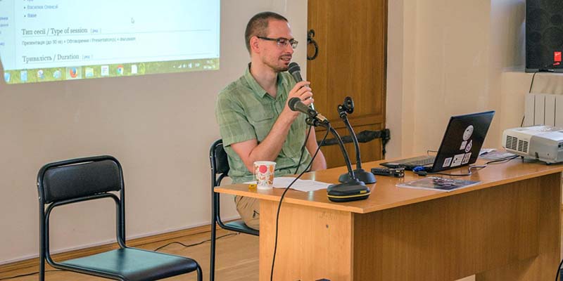 man speaking into microphone