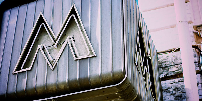 box with the letter "M"