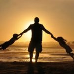 playing at sunset on the beach