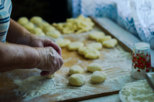 Man rolling dough