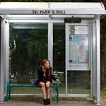 girl at bus stop