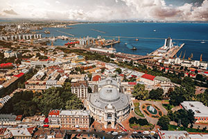 Theater in Odessa with seaport in background