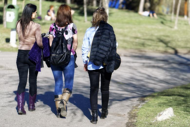 Three female students walking together