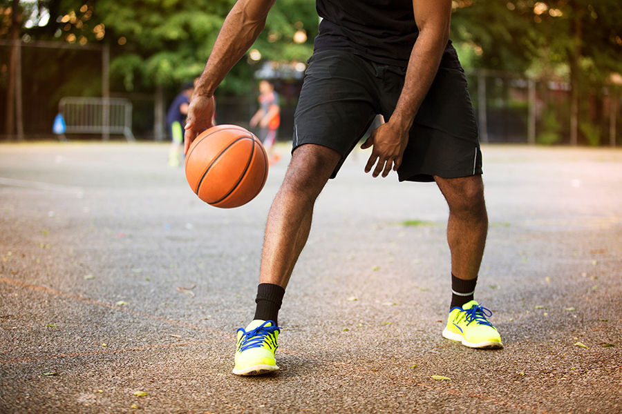 man playing basketball