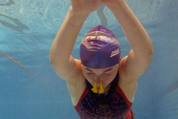 Female student swimming